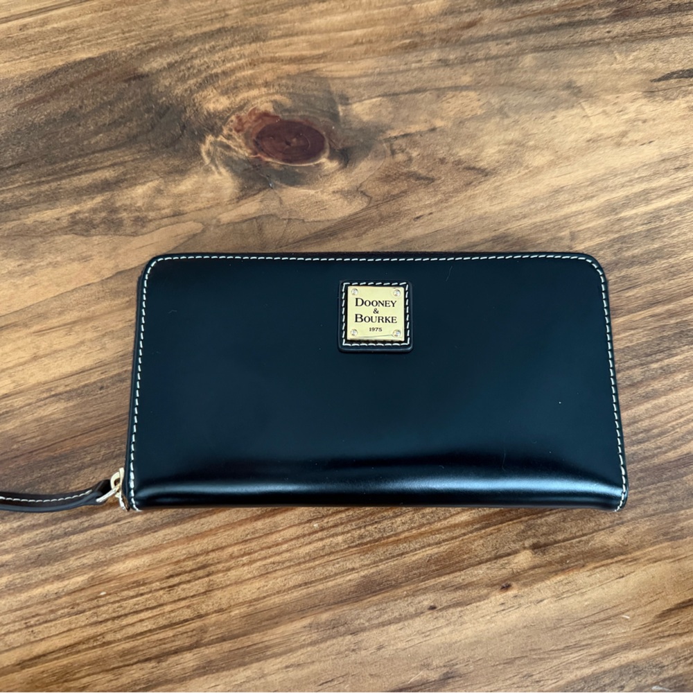 Dooney & Bourke Black Leather Zip Wristlet with Gold Plaque